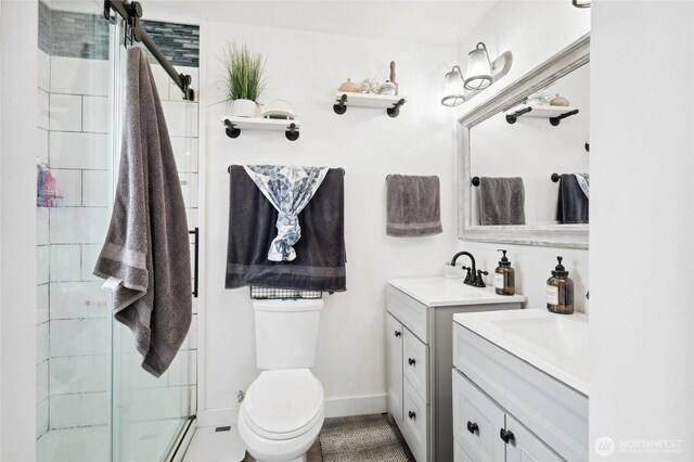 6515 Lawrence Rd, Everson, WA 98247 - bathroom featuring vanity, a shower stall, toilet, and baseboards