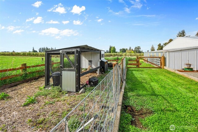 6515 Lawrence Rd, Everson, WA 98247 - view of yard with exterior structure, an outbuilding, and a view of countryside