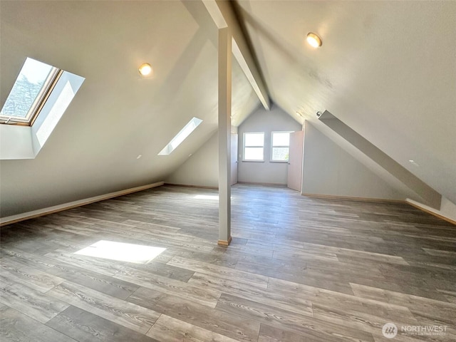 12 Diamond Dr, Pacific Beach, WA 98571 - bonus room with a skylight and wood finished floors