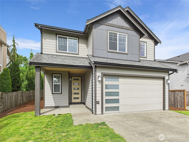 14419 45th Ln S, Tukwila, WA 98168 - view of front of house featuring a garage, covered porch, driveway, and roof with shingles
