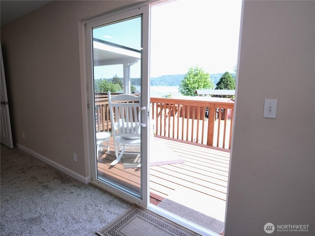 340 N Terrace Rd, Hoodsport, WA 98548 - doorway to outside with carpet floors and baseboards