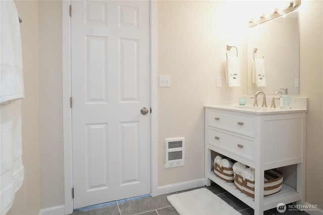 340 N Terrace Rd, Hoodsport, WA 98548 - bathroom featuring baseboards, tile patterned flooring, heating unit, and vanity