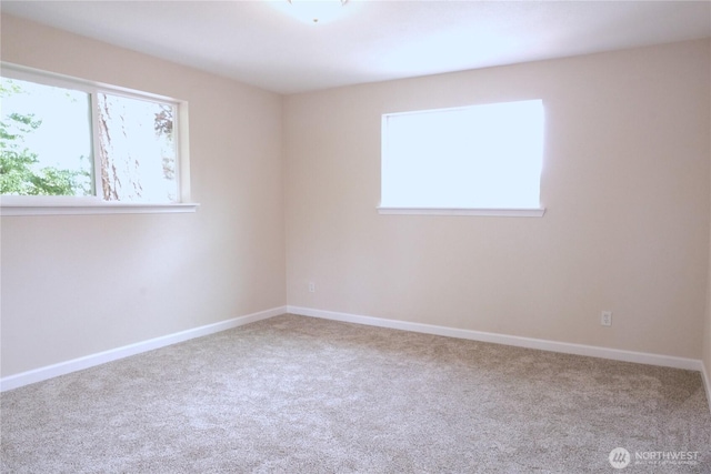 340 N Terrace Rd, Hoodsport, WA 98548 - spare room featuring healthy amount of natural light, carpet floors, and baseboards