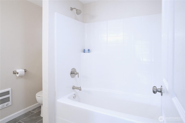 340 N Terrace Rd, Hoodsport, WA 98548 - full bathroom featuring toilet, baseboards, heating unit, shower / bath combination, and tile patterned flooring