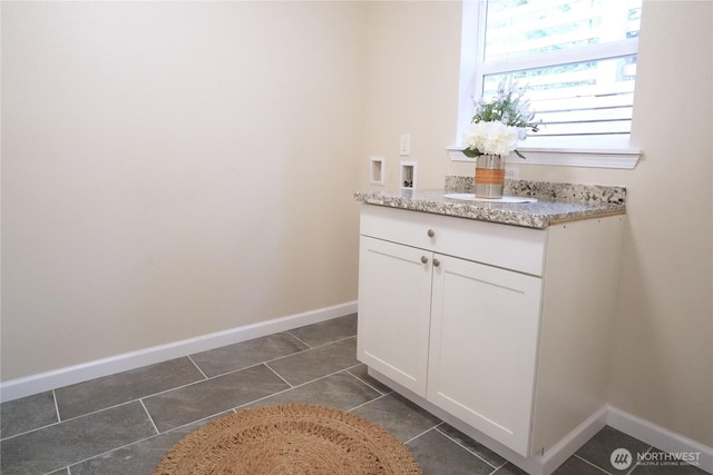 340 N Terrace Rd, Hoodsport, WA 98548 - bathroom with baseboards, tile patterned floors, and vanity