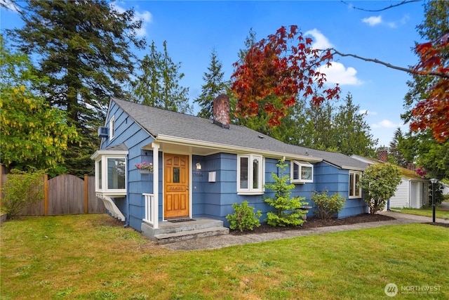 view of front of property featuring a chimney