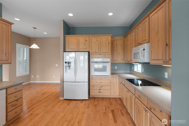 4420 Vashon Dr NE, Lacey, WA 98516 - kitchen with white appliances, light brown cabinetry, light wood finished floors, light countertops, and recessed lighting