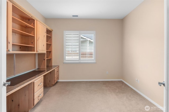 4420 Vashon Dr NE, Lacey, WA 98516 - unfurnished office featuring built in desk, light colored carpet, and baseboards