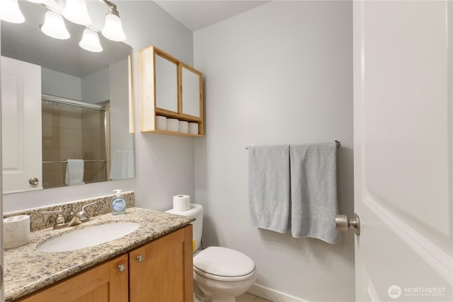 705 E Republican St Unit 207, Seattle, WA 98102 - bathroom featuring a shower with shower door, toilet, and vanity