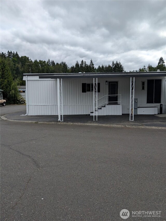 2302 R St SE Unit 128, Auburn, WA 98002 - manufactured / mobile home with a porch