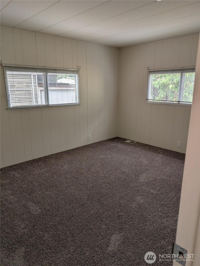 2302 R St SE Unit 128, Auburn, WA 98002 - empty room featuring carpet floors
