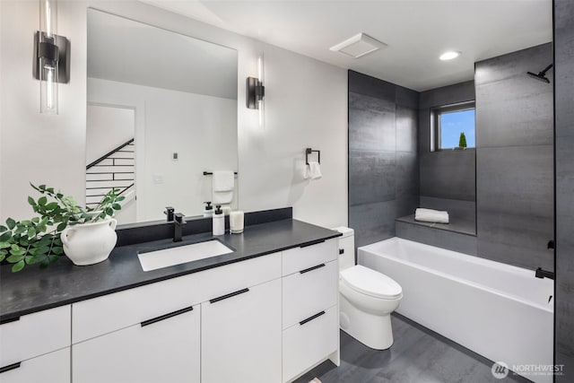 full bathroom with toilet, shower / bath combination, vanity, and wood finished floors