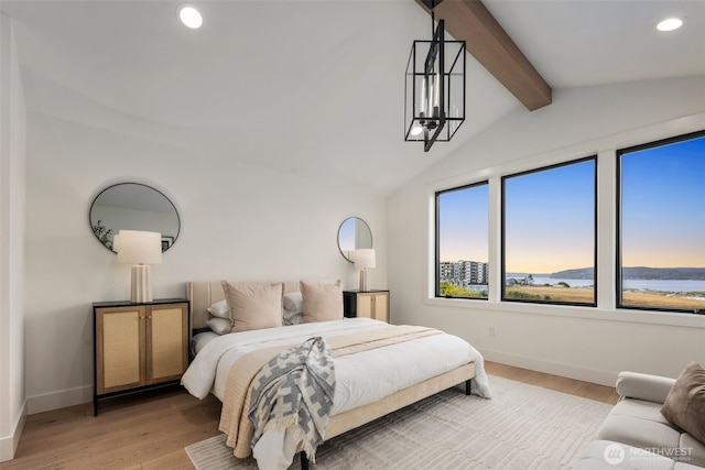 bedroom with baseboards, light wood finished floors, recessed lighting, and a chandelier