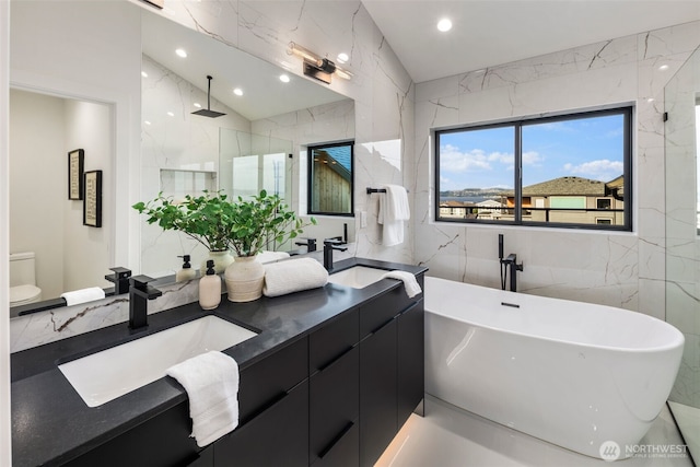 5301 N Commercial St, Ruston, WA 98407 - full bath featuring tile walls, a marble finish shower, double vanity, lofted ceiling, and recessed lighting