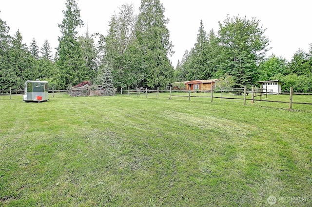 472 Iris Ln, Camano Island, WA 98282 - view of yard featuring a detached garage and an outdoor structure