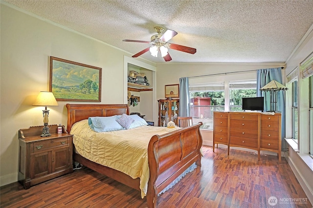 472 Iris Ln, Camano Island, WA 98282 - bedroom with dark wood-style floors, a textured ceiling, multiple windows, crown molding, and a ceiling fan