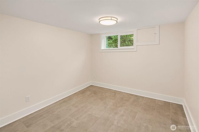 816 N 43rd St, Seattle, WA 98103 - empty room with baseboards