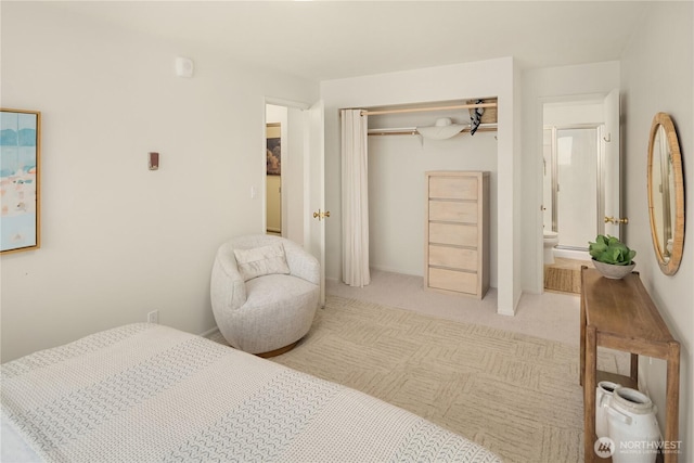 2501 Canterbury Ln E Unit 318, Seattle, WA 98112 - bedroom with carpet, a closet, and ensuite bath