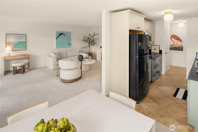 2501 Canterbury Ln E Unit 318, Seattle, WA 98112 - kitchen featuring appliances with stainless steel finishes, open floor plan, and white cabinets