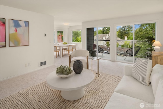 2501 Canterbury Ln E Unit 318, Seattle, WA 98112 - living area with light carpet and baseboards