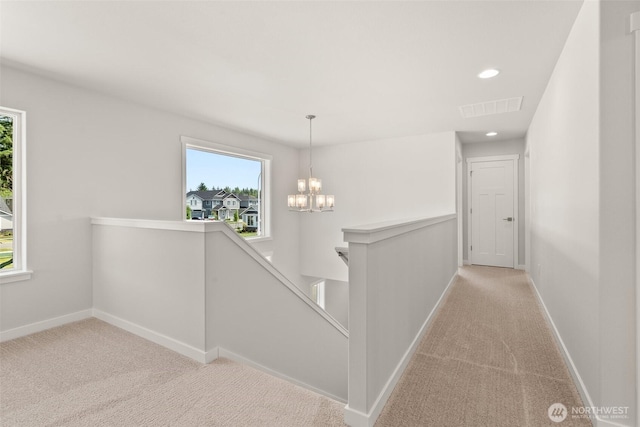 2880 75th Ave SW Lot 62, Tumwater, WA 98512 - hallway with an upstairs landing, carpet flooring, a chandelier, and recessed lighting