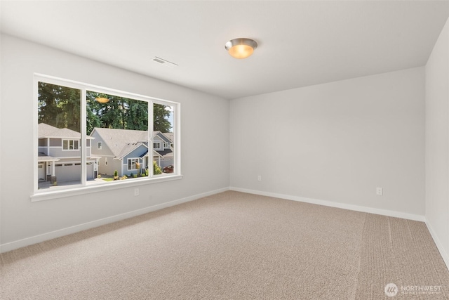 2880 75th Ave SW Lot 62, Tumwater, WA 98512 - carpeted spare room featuring baseboards