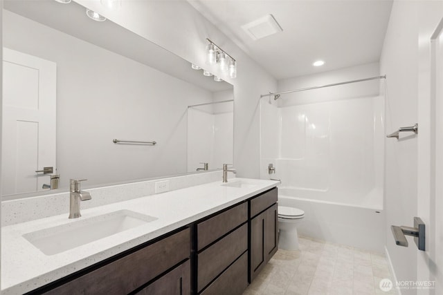 2880 75th Ave SW Lot 62, Tumwater, WA 98512 - bathroom featuring double vanity, shower / washtub combination, and recessed lighting