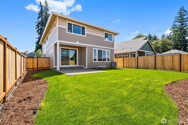 2880 75th Ave SW Lot 62, Tumwater, WA 98512 - back of property featuring board and batten siding, a patio area, and a fenced backyard