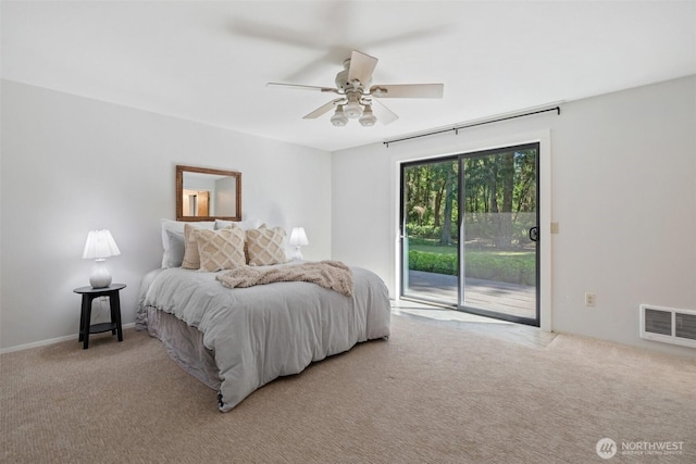 bedroom with carpet floors, access to exterior, and a ceiling fan