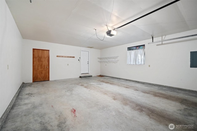 garage featuring a garage door opener and electric panel