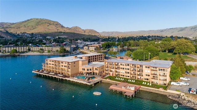 bird's eye view of a water and mountain view