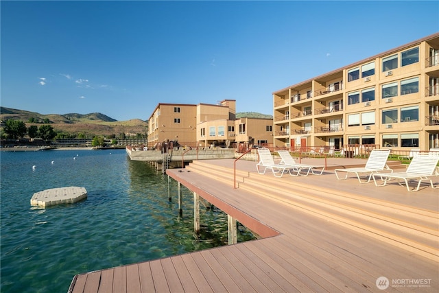 dock with a water and mountain view