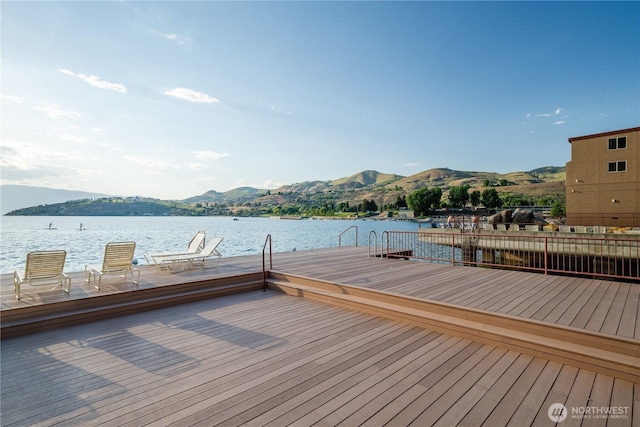 dock featuring a water and mountain view