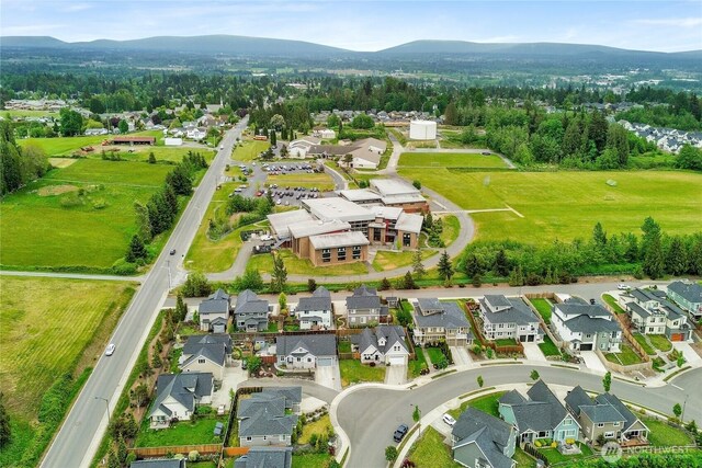 6068 Monument Dr, Ferndale, WA 98248 - aerial perspective of suburban area with a mountainous background