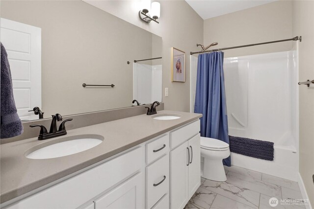 6068 Monument Dr, Ferndale, WA 98248 - full bath with marble look tile flooring, shower / bath combination with curtain, toilet, and double vanity