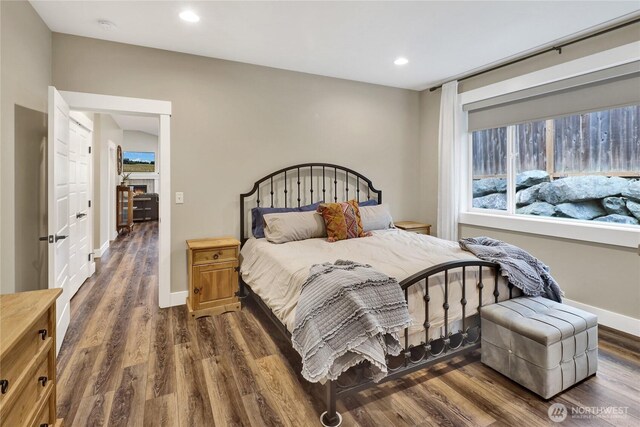 6068 Monument Dr, Ferndale, WA 98248 - bedroom featuring dark wood-style flooring, recessed lighting, and baseboards