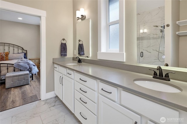 6068 Monument Dr, Ferndale, WA 98248 - full bath featuring marble finish floors, connected bathroom, a marble finish shower, and double vanity