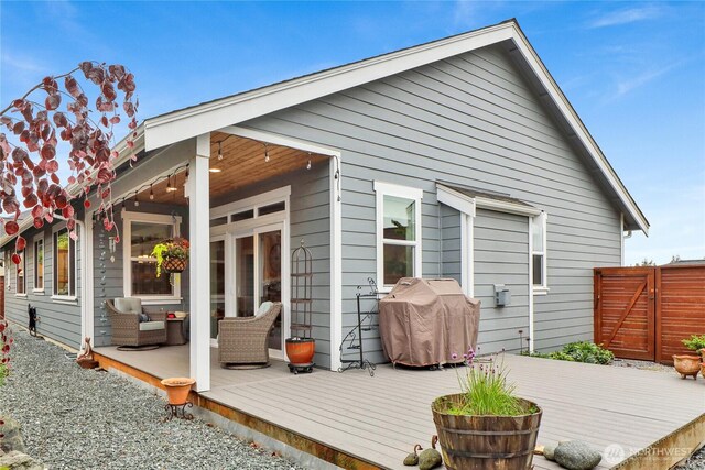 6068 Monument Dr, Ferndale, WA 98248 - back of property with a deck and fence