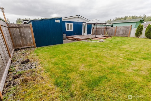 1101 S Scheuber Rd # 27, Centralia, WA 98531 - view of yard featuring a wooden deck and central AC