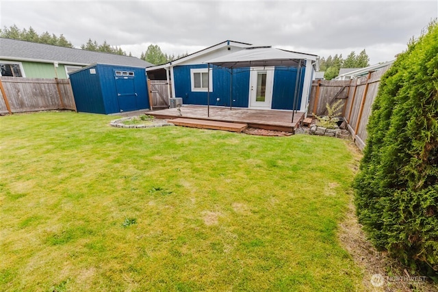1101 S Scheuber Rd # 27, Centralia, WA 98531 - back of house with a gazebo, a deck, a storage unit, and an outdoor structure