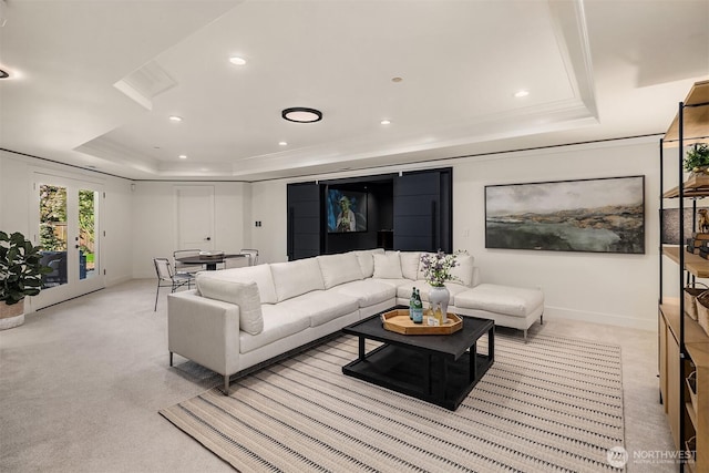 9234 NE 25th St, Clyde Hill, WA 98004 - living room with a tray ceiling, light colored carpet, recessed lighting, baseboards, and crown molding
