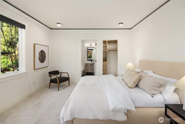 9234 NE 25th St, Clyde Hill, WA 98004 - carpeted bedroom featuring baseboards and a walk in closet