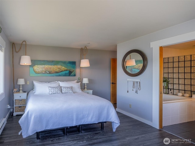 bedroom featuring wood finished floors and baseboards