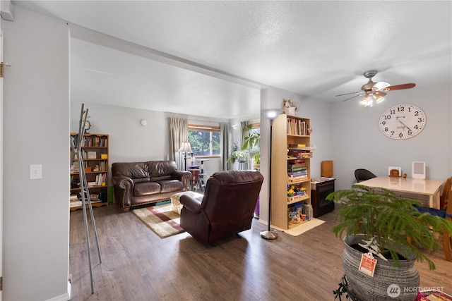 701 5th Ave S Unit C105, Kent, WA 98032 - living area with wood finished floors, a ceiling fan, and a desk