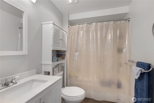 701 5th Ave S Unit C105, Kent, WA 98032 - full bathroom with toilet, vanity, and shower / bathtub combination with curtain