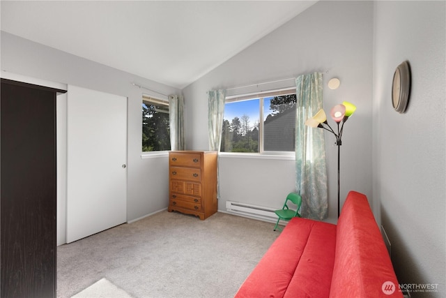 701 5th Ave S Unit C105, Kent, WA 98032 - sitting room with lofted ceiling, a baseboard heating unit, and carpet flooring