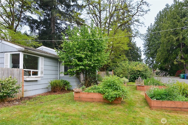 1917 NE 143rd St, Seattle, WA 98125 - view of yard with a vegetable garden