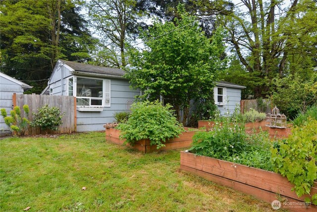 1917 NE 143rd St, Seattle, WA 98125 - view of yard with a vegetable garden