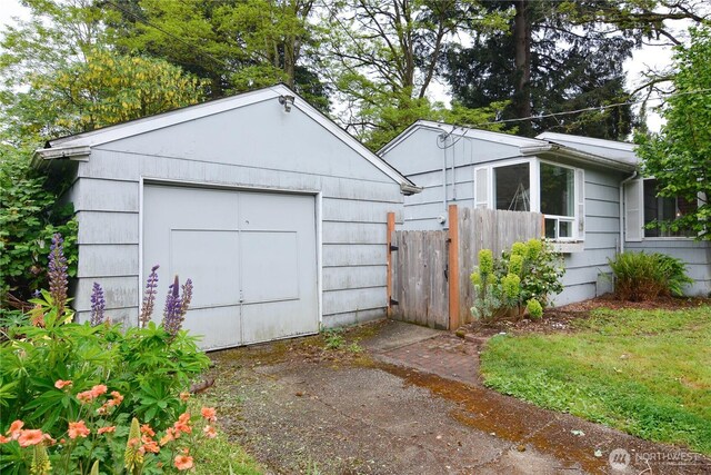 1917 NE 143rd St, Seattle, WA 98125 - detached garage featuring fence