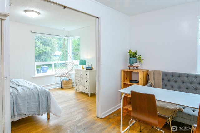 1917 NE 143rd St, Seattle, WA 98125 - bedroom with light wood-type flooring and baseboards